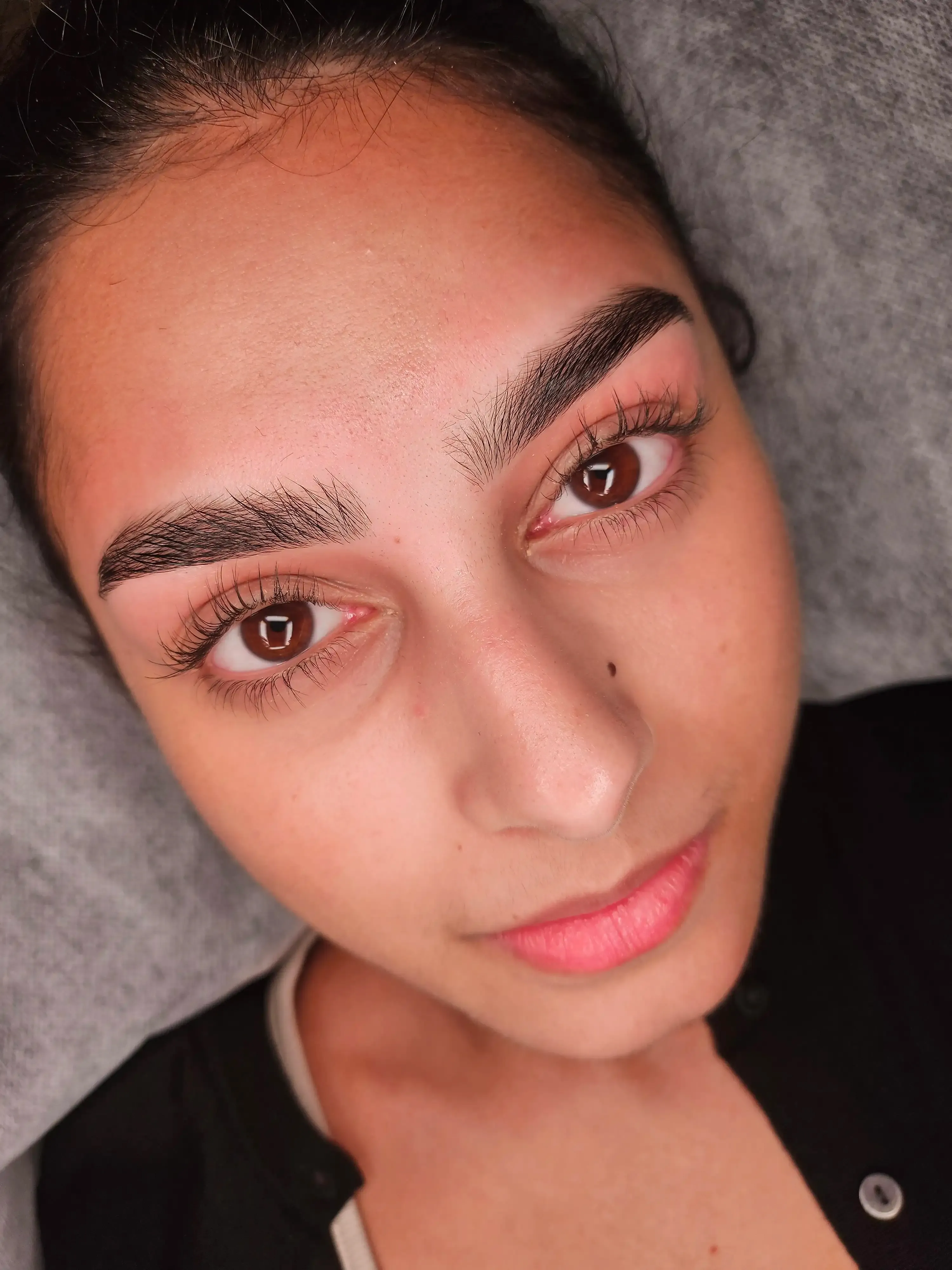 A client's finished brows and lashes, photographed in the studio