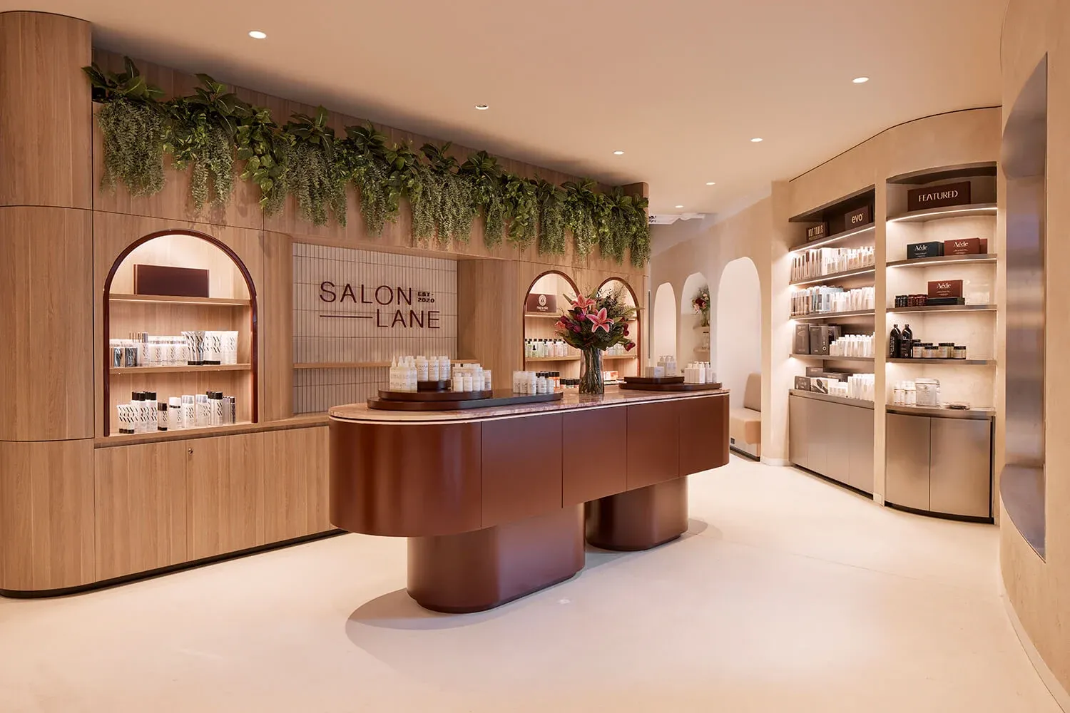 The Salon Lane reception in St Leonards, with timber joinery and warm lighting
